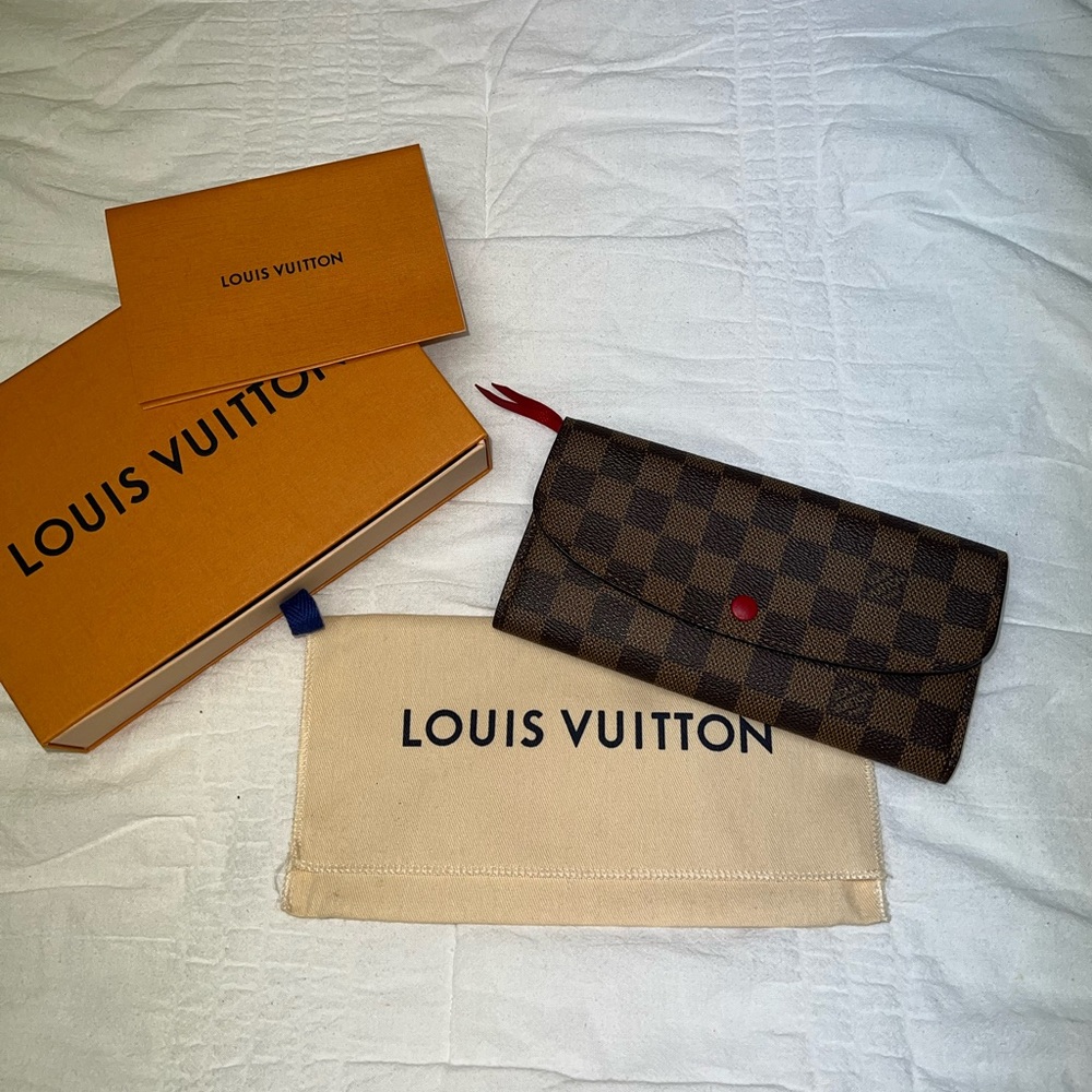Louis Vuitton Emilie Wallet in Damier Ebene print color Rogue Red